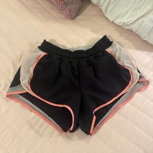 LULULEMON shorts black and peach sz 4